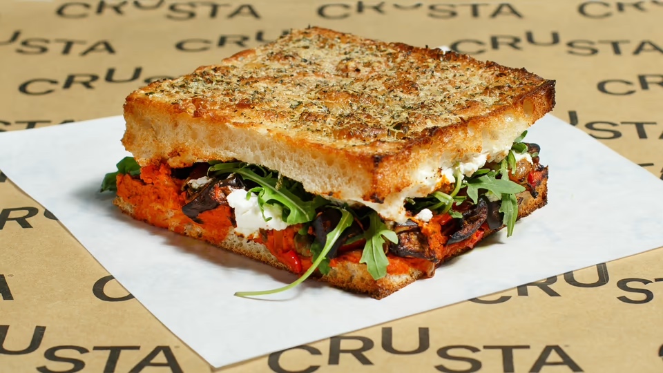 Eggplant Caponata & Ricotta - Eggplant caponata, whipped ricotta cheese, roasted red pepper paste, and baby rocket leaves on a freshly baked parmesan & italian herb focaccia. These type of Italian sandwiches are served with freshly baked focaccia and chilled gourmet ingredients. The fillings are not heated in order to maintain their quality.
Allergens
wheat, celery and products thereof, milk